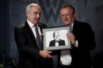Nicolae Ratiu presenting Adam Michnik with the Ion Ratiu Democracy Award