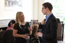 Carol Maund, director of the Site Gallery, Sheffield, talking to a member of the audience before the presentation