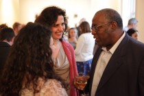 Ramona Mitrica and Mike Phillips talking to a member of the audience at the after-event reception