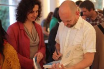 Andrew Mottershead signing a copy of 'The Shops Project' for Ramona Mitrica