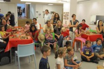 The audience watching the master at work