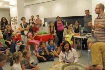 The audience watching the master at work