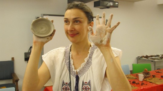 Monica Madas, who came especially from London, displays with pride the results of her work