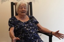 Elisabeth Ratiu. In the background, her 1954 portrait by Romanian artist Dimitrie Berea. London, May 2011